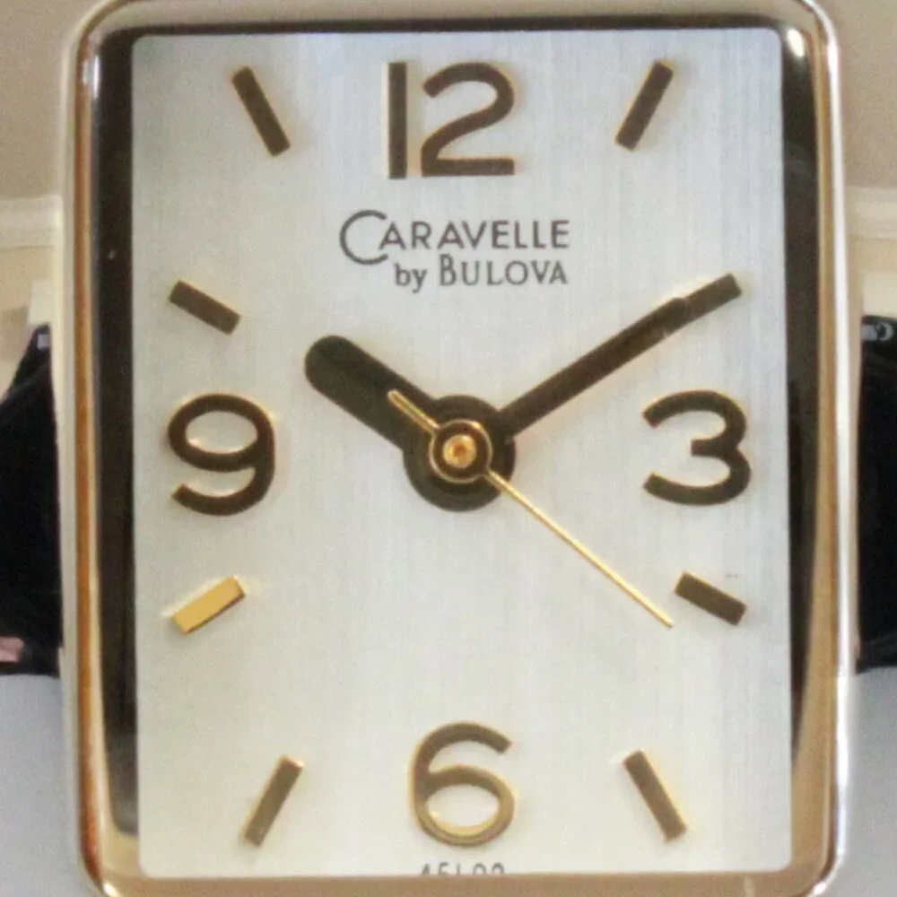 Caravelle Ladies Silver Tone With Gold Accents ½ Bangle Bracelet MOP Dial 16mm